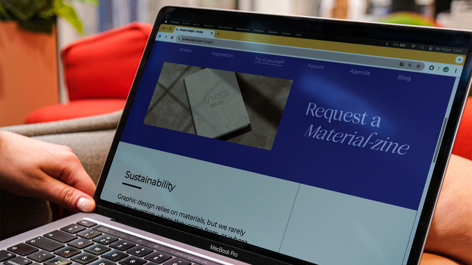 Arveta website on laptop with request zine page